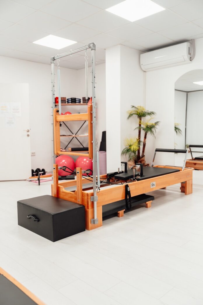a gym with a treadmill and exercise equipment
