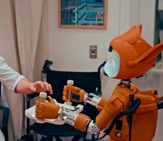 AI, 일상 속 건강 지킴이로 자리잡다 Man gives robot bottles on a tray